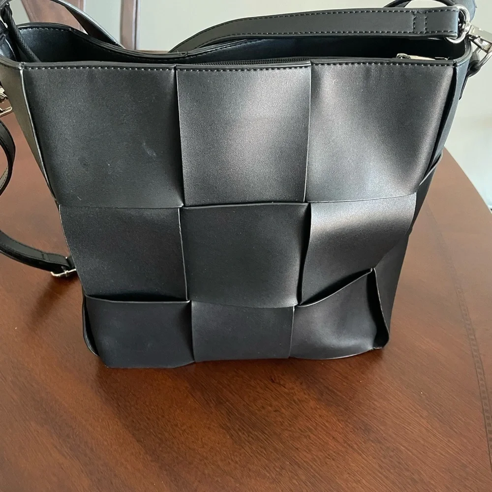 Expression NYC women’s black large wowen pattern Foux leather shoulder bag.